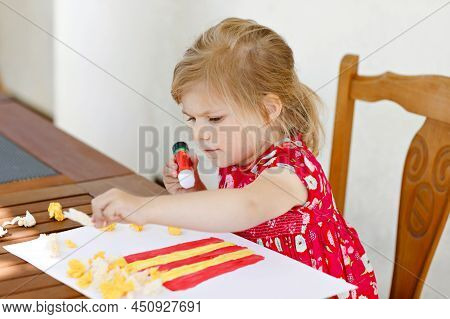Little Creative Toddler Girl Painting With Finger Colors Popcorn Box And Making Paper Corns With Glu