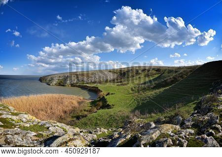 rocky shore of Razelm lake, Romania