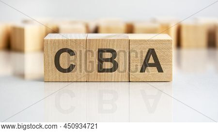 Cba Word Written On Wood Block, Business Concept. Cba - Short For Cost Benefit Analysis