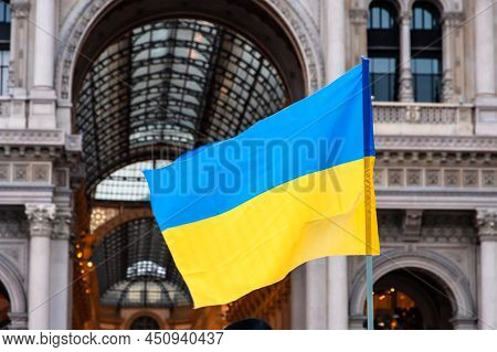 Ukrainian Flag Waved In Duomo Square In A Protest Against Russia Invasion, Milan