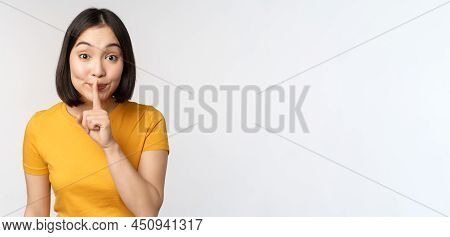 Keep Quiet. Cute Asian Woman Make Shhh Gest, Showing Shush, Hush Sign, Press Finger To Lips, Silence