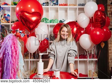 Woman With Composition Of White, Red, Foil Balloons In Form Of Heart And Ball.
