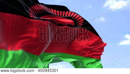 Detail Of The National Flag Of Malawi Waving In The Wind On A Clear Day. Malawi Is A Landlocked Coun