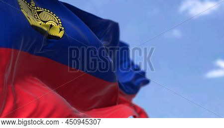 Detail Of The National Flag Of Liechtenstein Waving In The Wind On A Clear Day. Liechtenstein Is A C