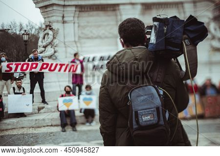 Lisbon, Portugal - February 24, 2022: True Tilt-shift Shot With Selective Focus On A Tv Operator Wit