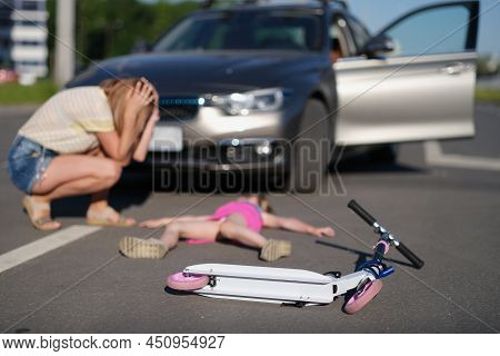 Portrait Of Girl With Scooter Hit On Road By Car, Eyewitness Worry For Child, Road Accident. Automob