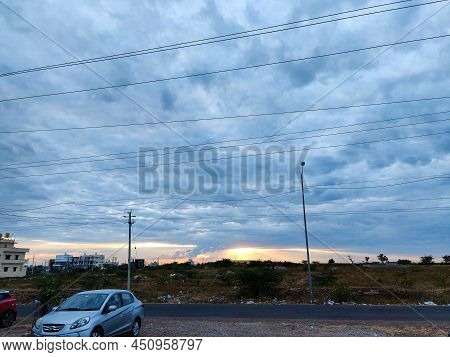 Talikoti, India- November 15th 2021; Stock Photo Of Blue Color Car Parked On The Side Of The Highway