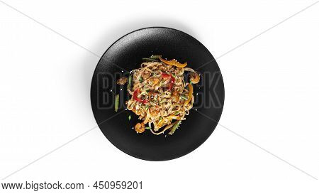 Wok Noodles With Seafood Isolated On A White Background. Pasta With Shrimp And Mussels.