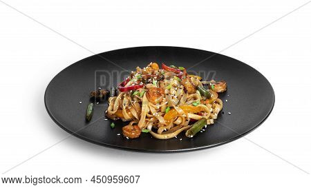 Wok Noodles With Seafood Isolated On A White Background. Pasta With Shrimp And Mussels.