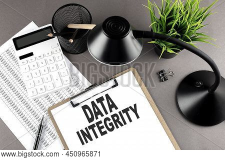 Clipboard ,chart And Calculator, Lamp And Workspace Accessories On Grey Table. Top View , Text Data 
