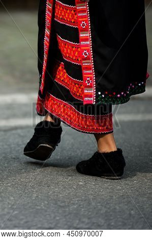 Close-up Young Lahu Hill Tribe Girls Feet In Traditional Clothing Are Dancing On A Street During New