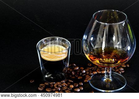 Den Helder, The Netherlands. January 2022. Close Up Of Coffee With Cognac On Black Background.