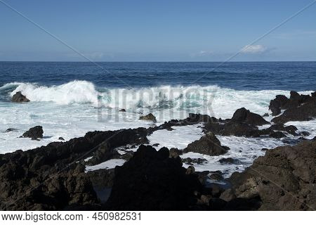 View On Black Lava Rocks In Small Village Punta Brava Near Puerto De La Cruz, Tenerife, Canary Islan