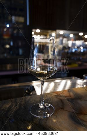 Glass Of Cold Dry Italian Pinot Grigio White Wine Served In Italian Bar