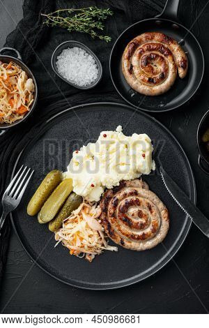 Fried Bavarian German Nürnberger Sausages With Sauerkraut, Mashed Potatoe, On Black Background, Top 
