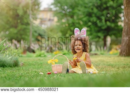Little Black Girl Wtfring Bunny Ears Gathering Easter Eggs
