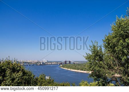 Panorama Of Kyiv, In Ukraine, With A View Over The Dnipro, Or Dnieper River And The City Center, Whi