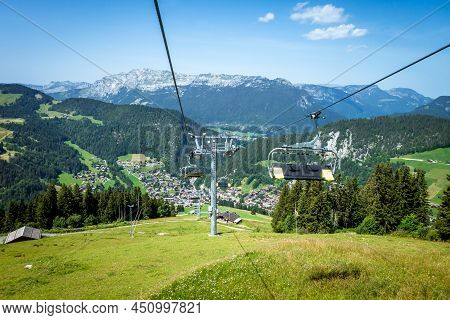 Chair Lift Above The Village Of La Clusaz In Summer, France