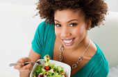 Close-up Of Beautiful African American Woman Eating Salad