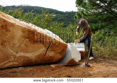 Worker Split Large Rock  For Road-works