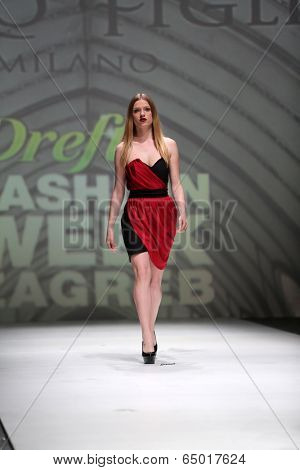 ZAGREB, CROATIA - MAY 09: Fashion model wearing clothes designed by Avaro Figlio on the Zagreb Fashion Week on May 09, 2014 in Zagreb, Croatia.