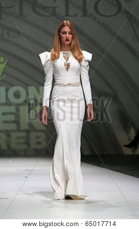 ZAGREB, CROATIA - MAY 09: Fashion model wearing clothes designed by Avaro Figlio on the Zagreb Fashion Week on May 09, 2014 in Zagreb, Croatia.