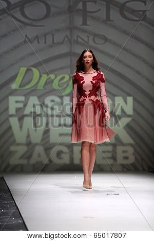 ZAGREB, CROATIA - MAY 09: Fashion model wearing clothes designed by Avaro Figlio on the Zagreb Fashion Week on May 09, 2014 in Zagreb, Croatia.