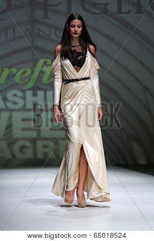 ZAGREB, CROATIA - MAY 09: Fashion model wearing clothes designed by Avaro Figlio on the Zagreb Fashion Week on May 09, 2014 in Zagreb, Croatia.