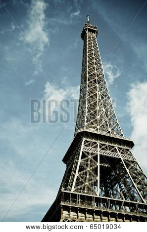 View of the Eiffel Tower with blue sky and white clouds, Paris, France