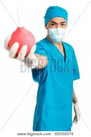 Medical Student With Enema Syringe