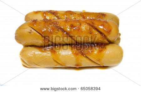 Grilled sausage with spicy sauce