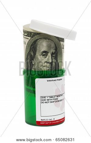 Pill Bottle With Money Isolated On White