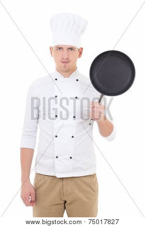 Young Handsome Man Chef In Uniform With Teflon Frying Pan Isolated On White