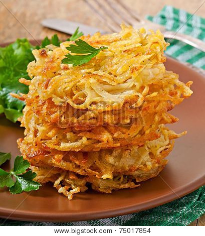 Fragrant potato pancakes with sour cream and herbs