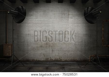 Professional strobe lights illuminating a backdrop