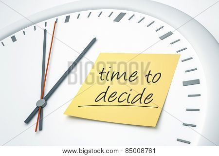 An image of a bright clock with a sticky note and the message time to decide