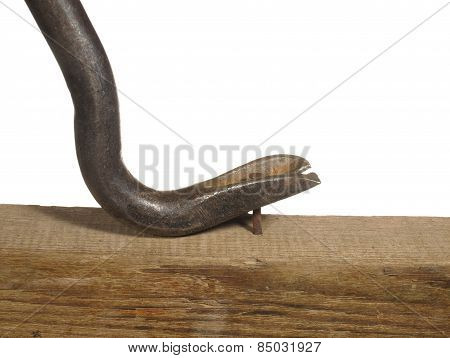 Steel Nail Puller To Pull Out A Nail Isolated On White Background.