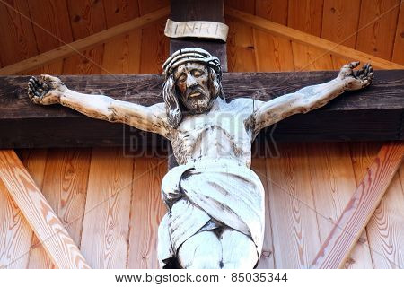 ST. GILGEN, AUSTRIA - DECEMBER 14: Crucifixion, Cemetery in St. Gilgen on Wolfgang See lake, Austria on December 14, 2014.