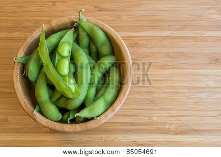 Japanese green soy bean on the wooden table.