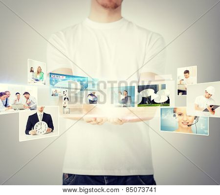 technology, internet, tv and news concept - man hands with virtual screens