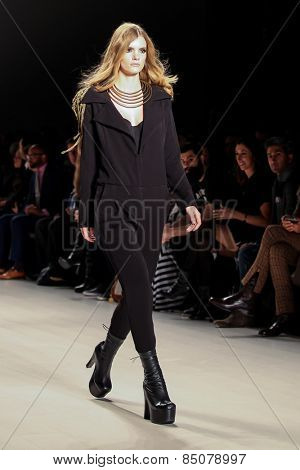 NEW YORK - FEBRUARY 13: A model walks the runway at the Mark & Estel Fall/Winter 2015 collection during Mercedes-Benz Fashion Week in New York on February 13, 2015.