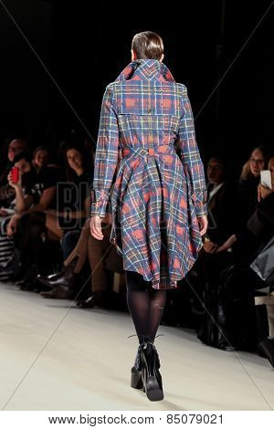 NEW YORK - FEBRUARY 13: A model walks the runway at the Mark & Estel Fall/Winter 2015 collection during Mercedes-Benz Fashion Week in New York on February 13, 2015.