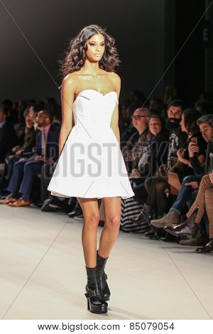 NEW YORK - FEBRUARY 13: A model walks the runway at the Mark & Estel Fall/Winter 2015 collection during Mercedes-Benz Fashion Week in New York on February 13, 2015.