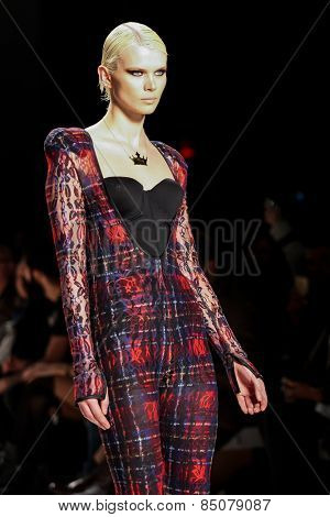 NEW YORK - FEBRUARY 13: A model walks the runway at the Mark & Estel Fall/Winter 2015 collection during Mercedes-Benz Fashion Week in New York on February 13, 2015.