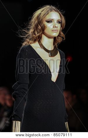 NEW YORK - FEBRUARY 13: A model walks the runway at the Mark & Estel Fall/Winter 2015 collection during Mercedes-Benz Fashion Week in New York on February 13, 2015.