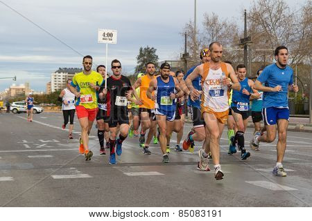 VALENCIA, SPAIN - MARCH 1, 2015: Runners compete in the III 15K Valencia Abierta al Mar run in the streets of Valencia.