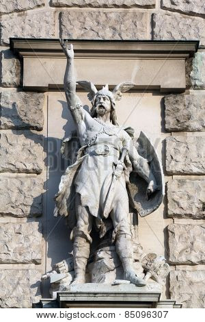 VIENNA, AUSTRIA - OCTOBER 10: Anton Brenek: Bajuware, on the facade of the Neuen Burg on Heldenplatz in Vienna, Austria on October 10, 2014.