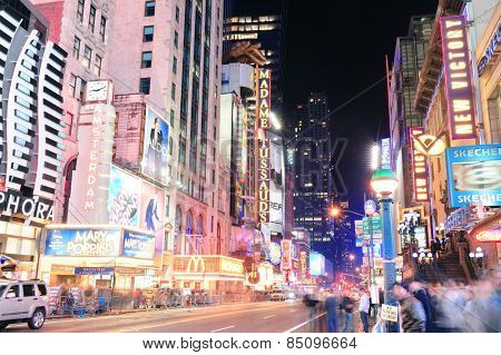 NEW YORK CITY, NY - DEC 12: 42nd Street with traffic and commercials on December  12, 2011 in New York City. 42nd Street is a major crosstown street known for its theaters and landmark architectures.