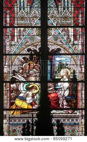 VIENNA, AUSTRIA - OCTOBER 11: Saint Cecilia, stained glass in Minoriten kirche in Vienna, Austria on October 11, 2014.