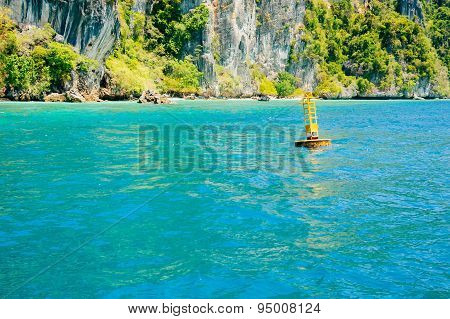 Green Sea Water Infront Of Green Island